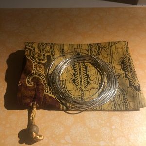 Set of 10 delicate sterling silver bangles